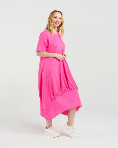 Model wearing Hot Pink Selena Dress By Seduce Available at Beetees Nelson